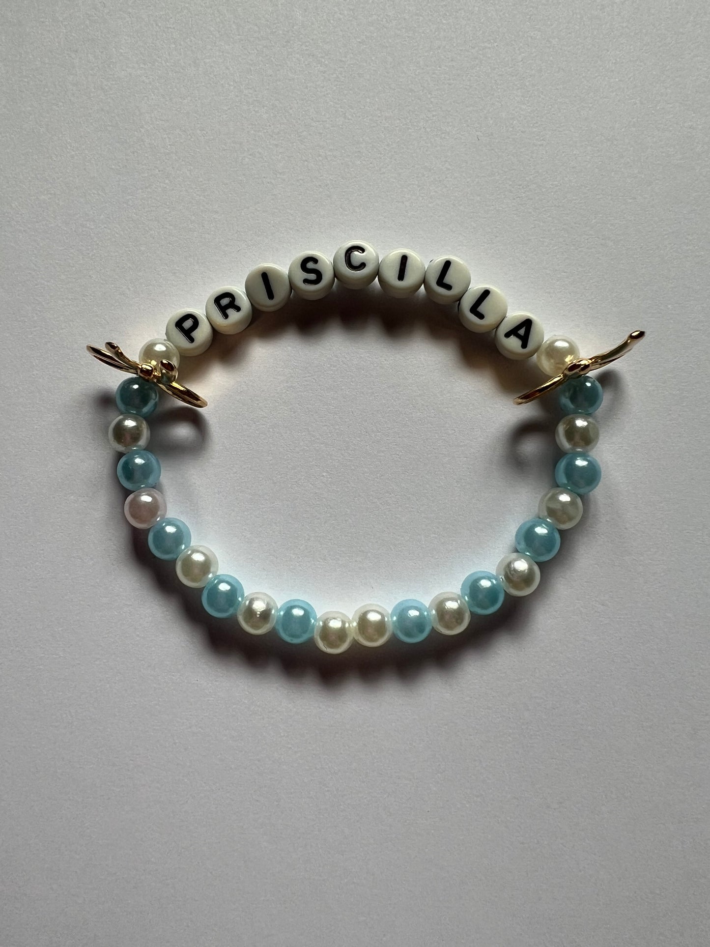 "PRISCILLA" THEMED CHARM BRACELETS