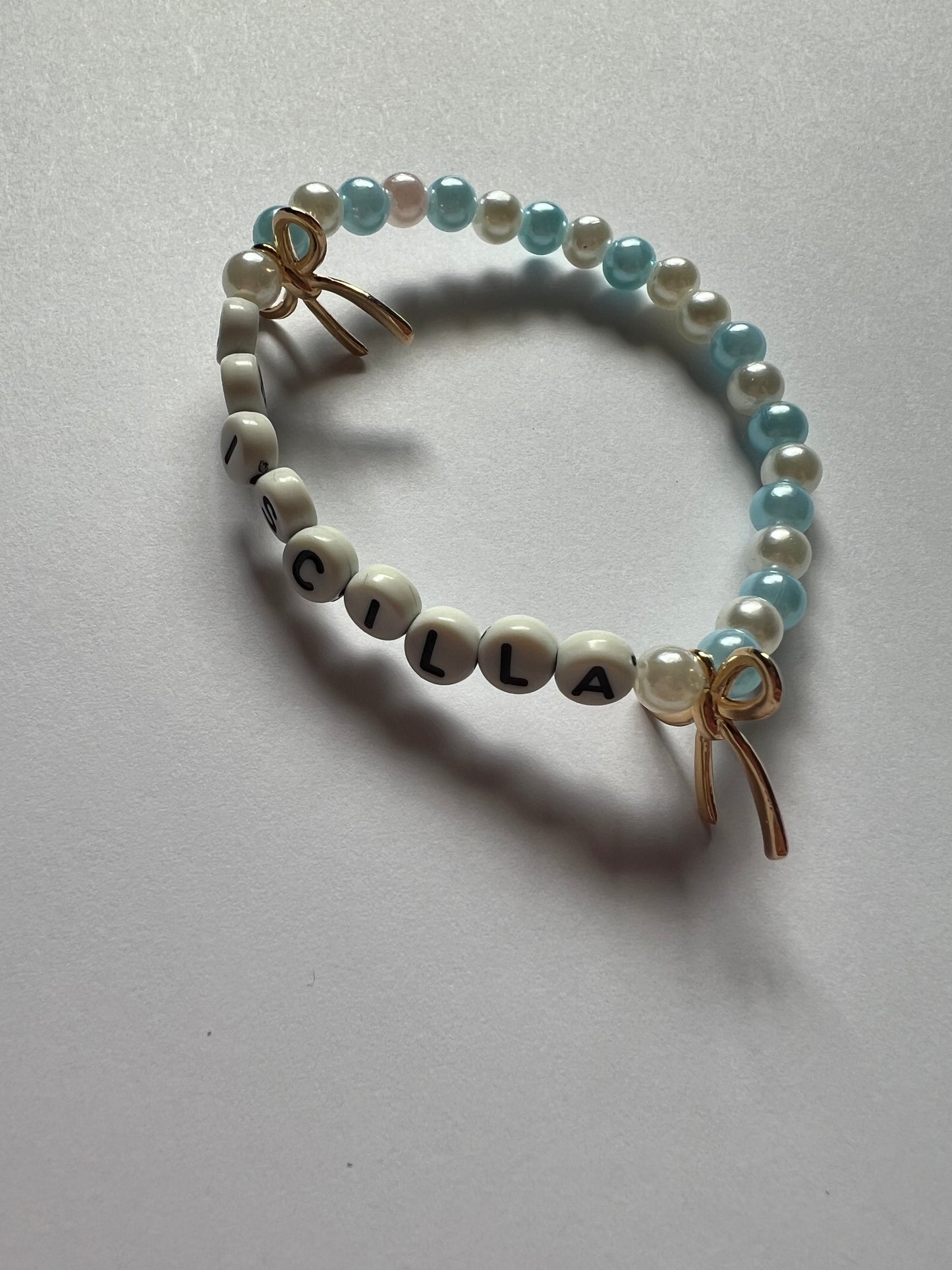 "PRISCILLA" THEMED CHARM BRACELETS
